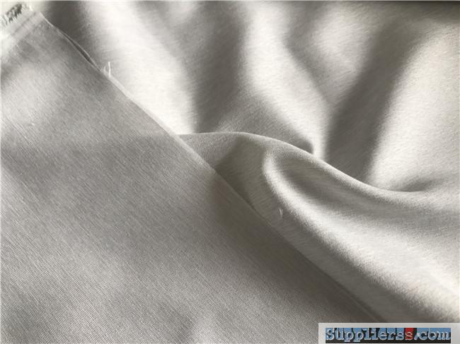 Polyester two tone melange microfiber fabric with cationic yarn
