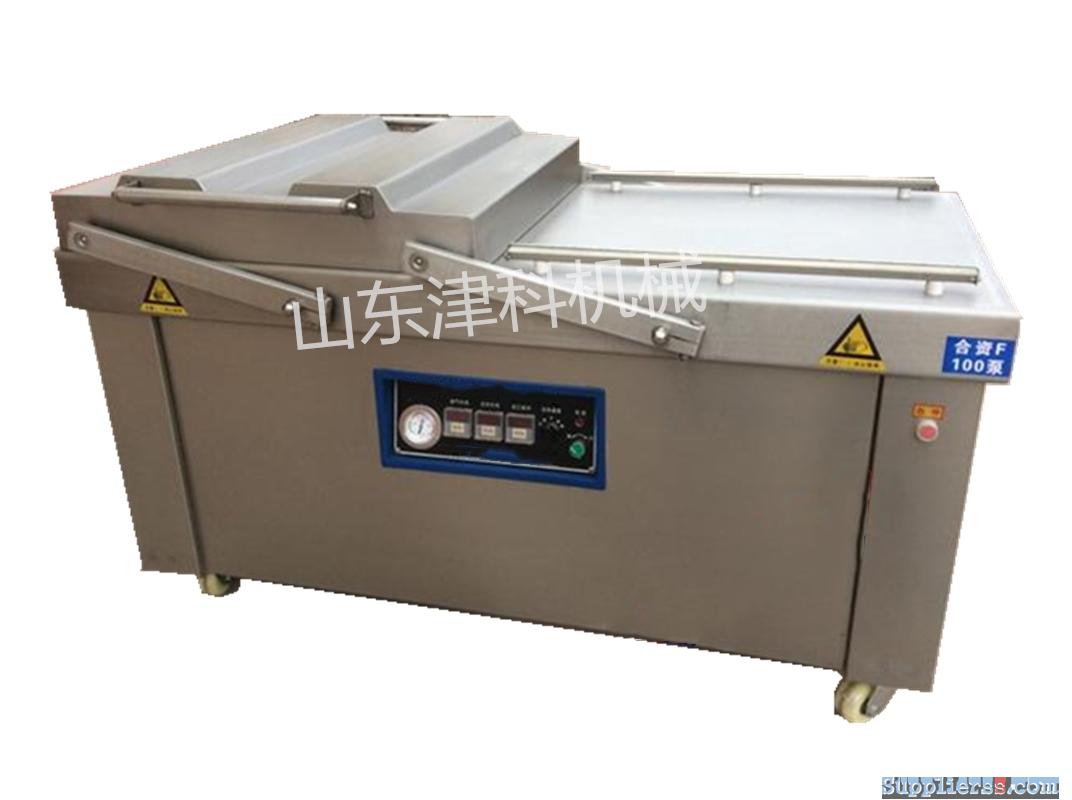 High-efficiency automatic double-chamber vacuum food packaging machine